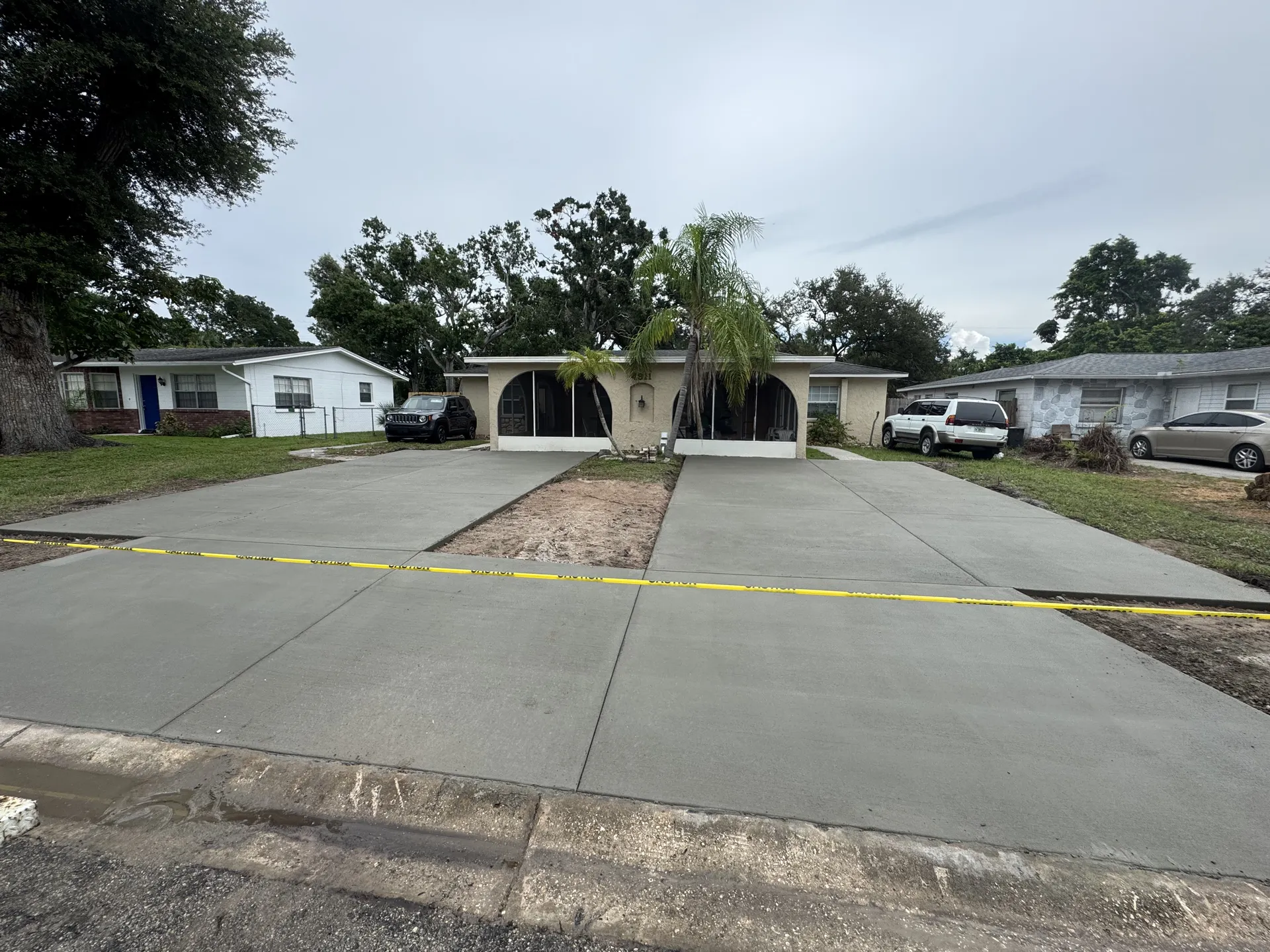New concrete driveway freshly poured for a residential home in Florida