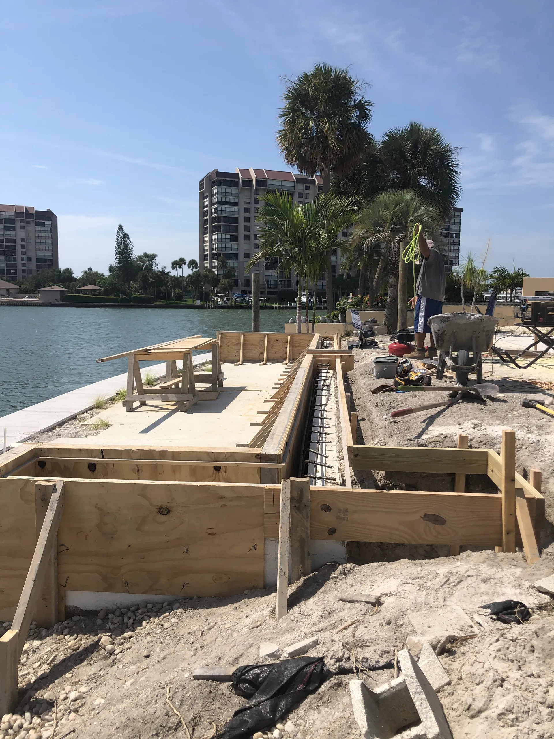 Foundation footer forms with rebar on a waterfront construction site